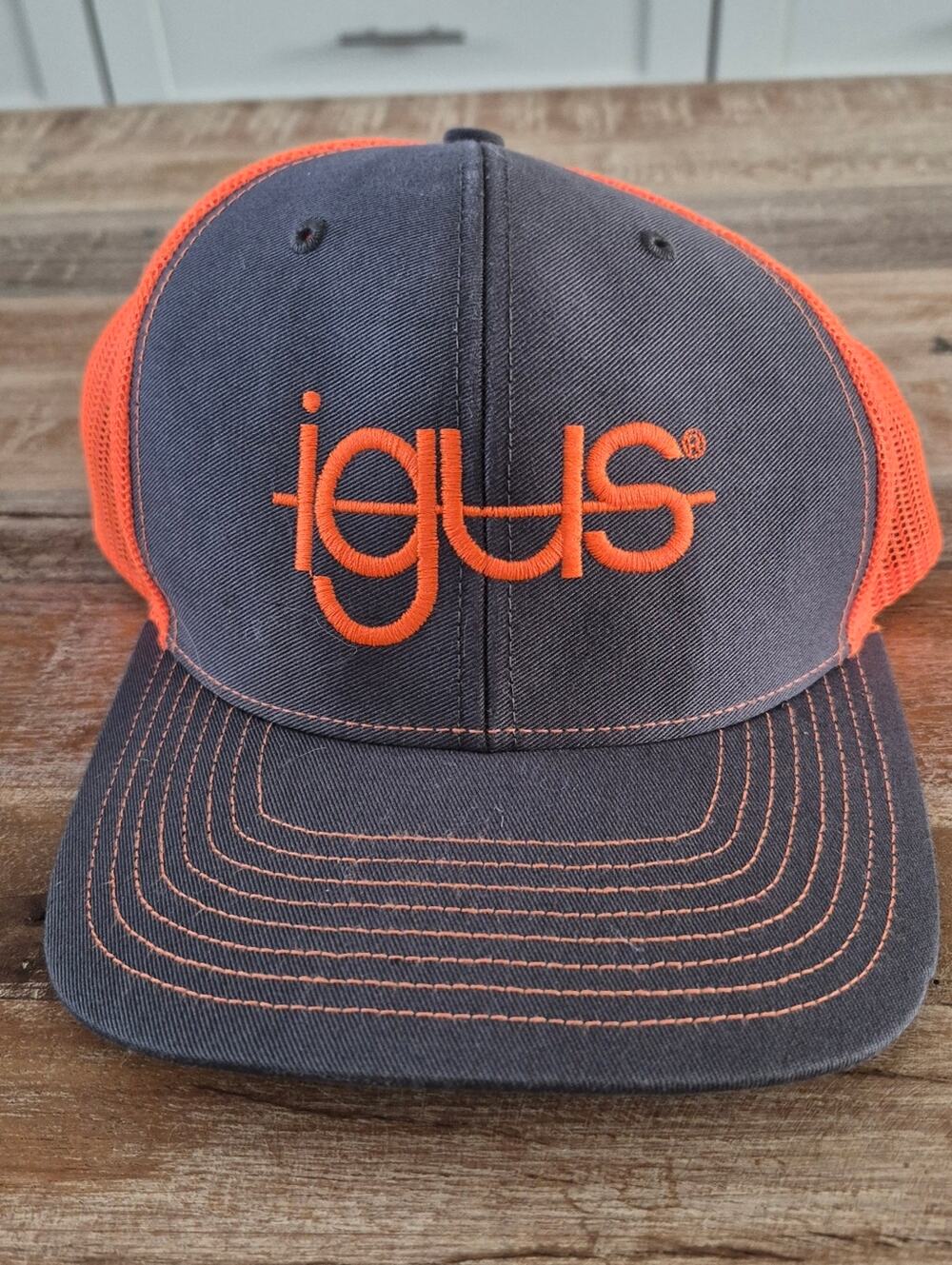 Richardson Style 112 igus Gray & Orange Mesh Logo Trucker Hat.